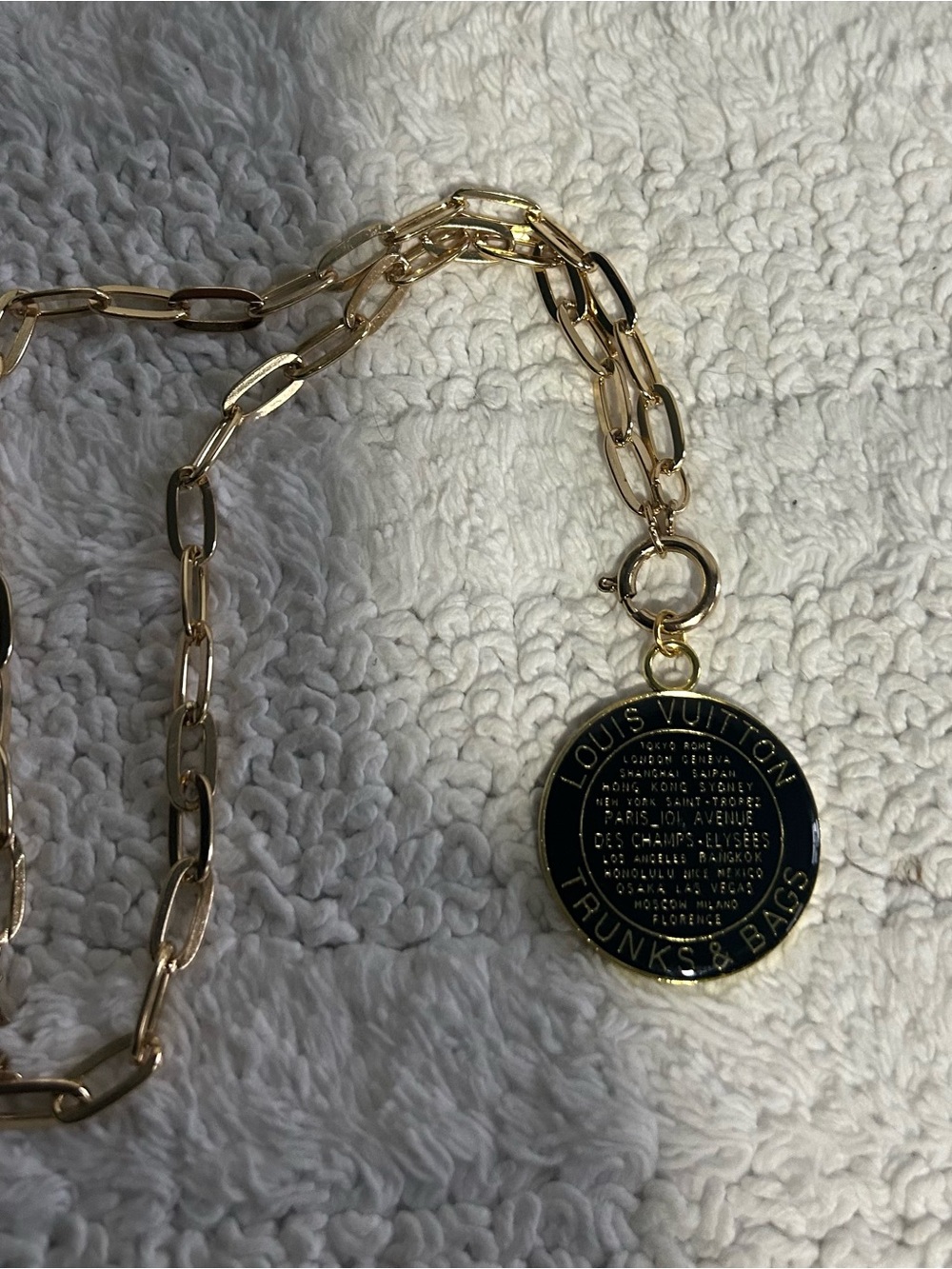 Gold-Tone Chain Necklace with Black Logo Medallion